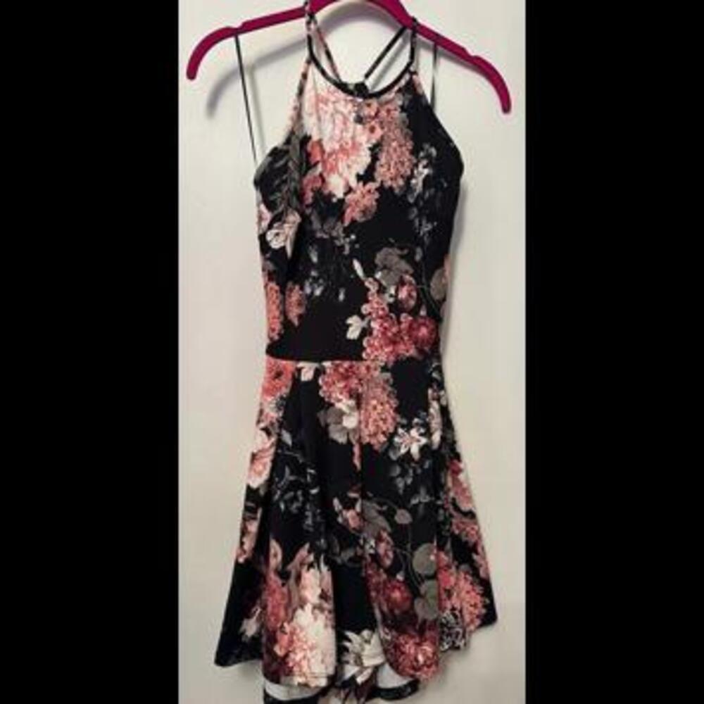 Midnight Garden Romper: Elegant and Chic with Black Floral Design